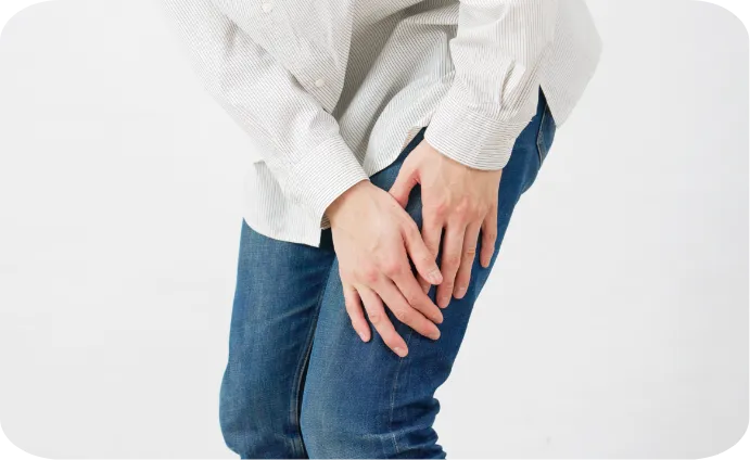 お尻が痛む女性
